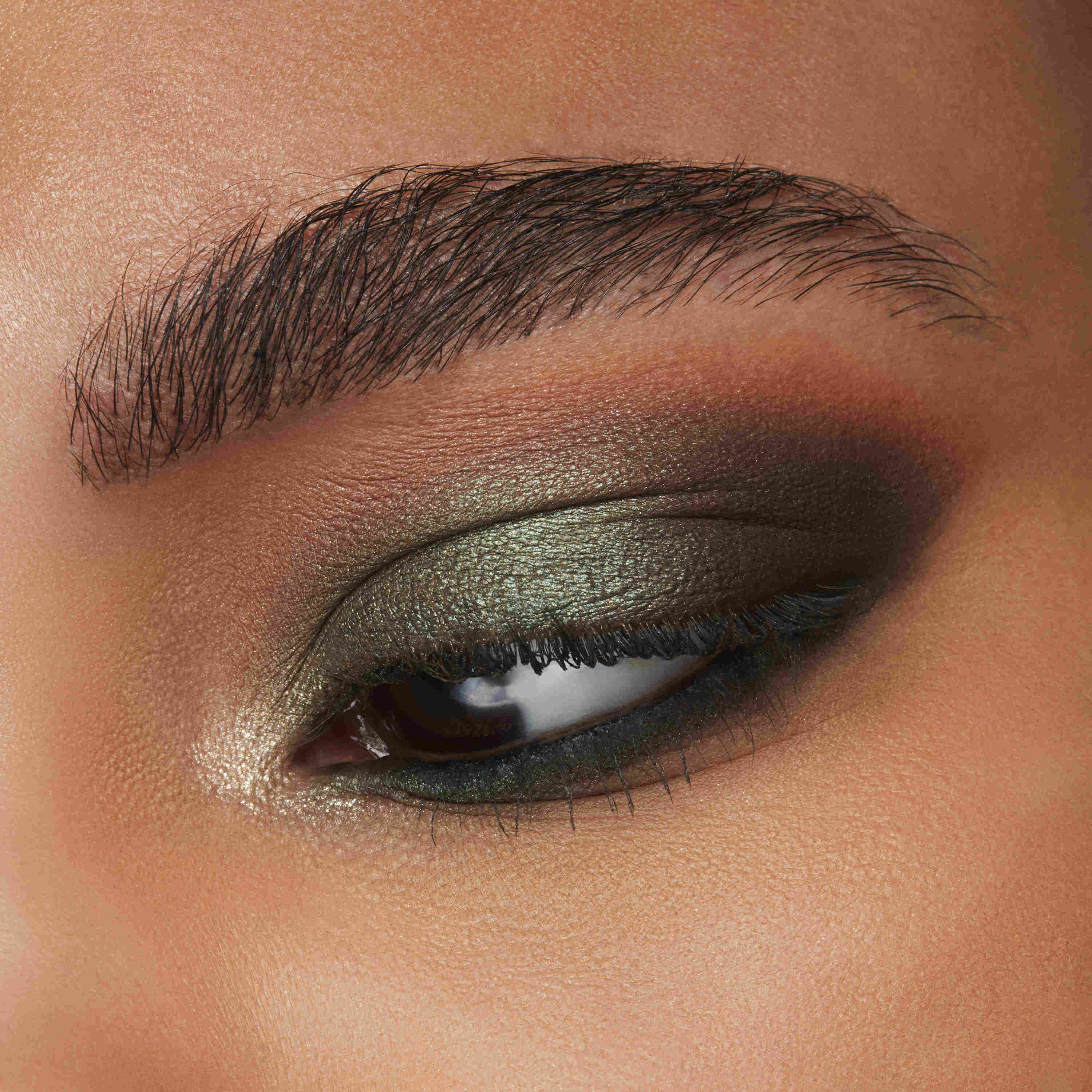 Close up of model face, showcasing a flawless foundation application and a natural glow